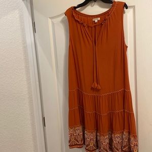 Sleeveless dress ,rust color, tie in front